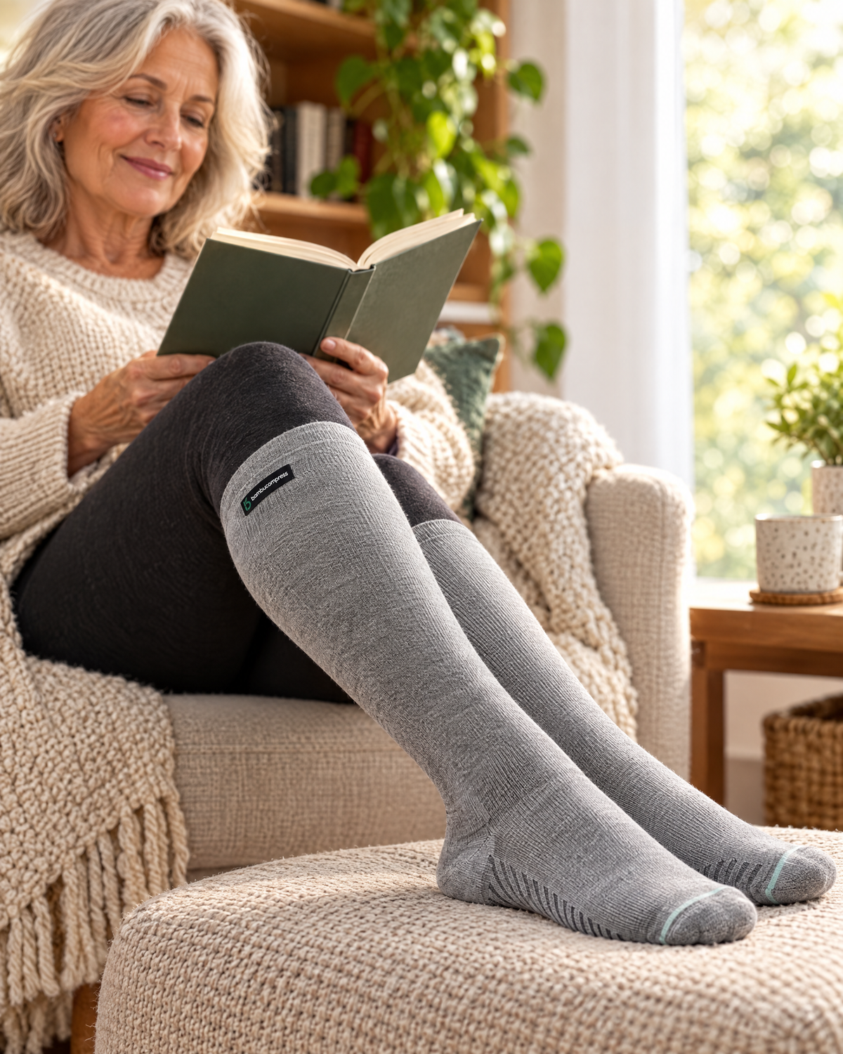 Person wearing the EASE+ Bamboo Compression Socks | Grey