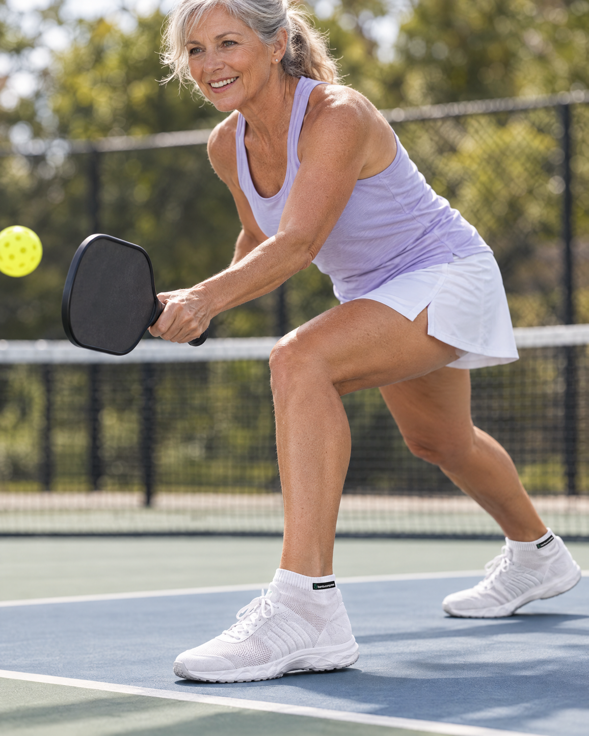 Person wearing the STEADY+ Cushion Compression Low Socks | White